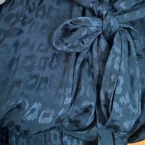 Black leopard print wide leg trousers